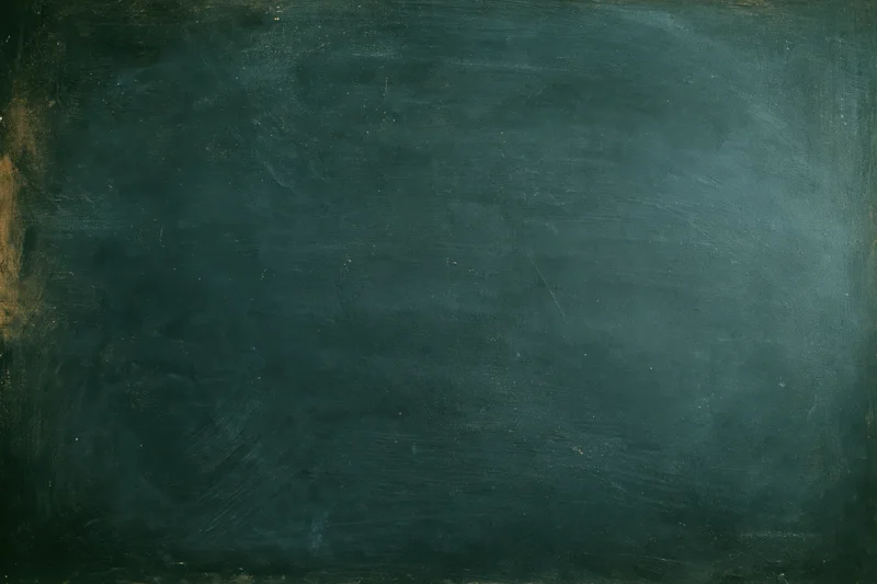 Worn dark green chalkboard surface filling the frame