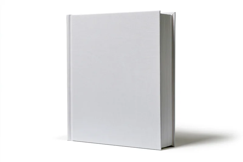 Blank white hardcover book standing upright on white background