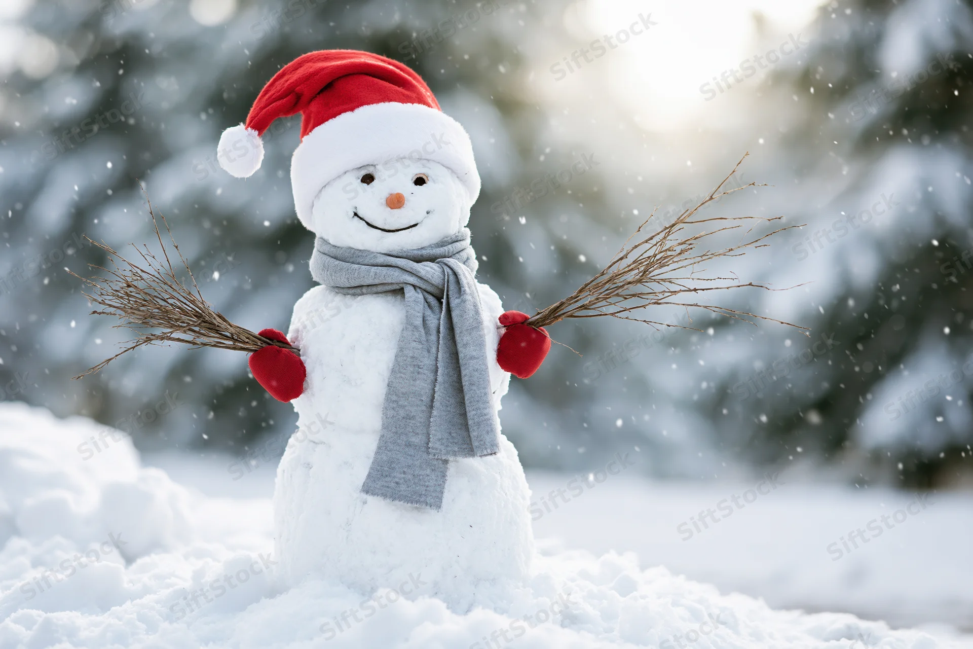 Cheerful snowman wearing red santa hat and gray scarf standing in snowy forest during snowfall