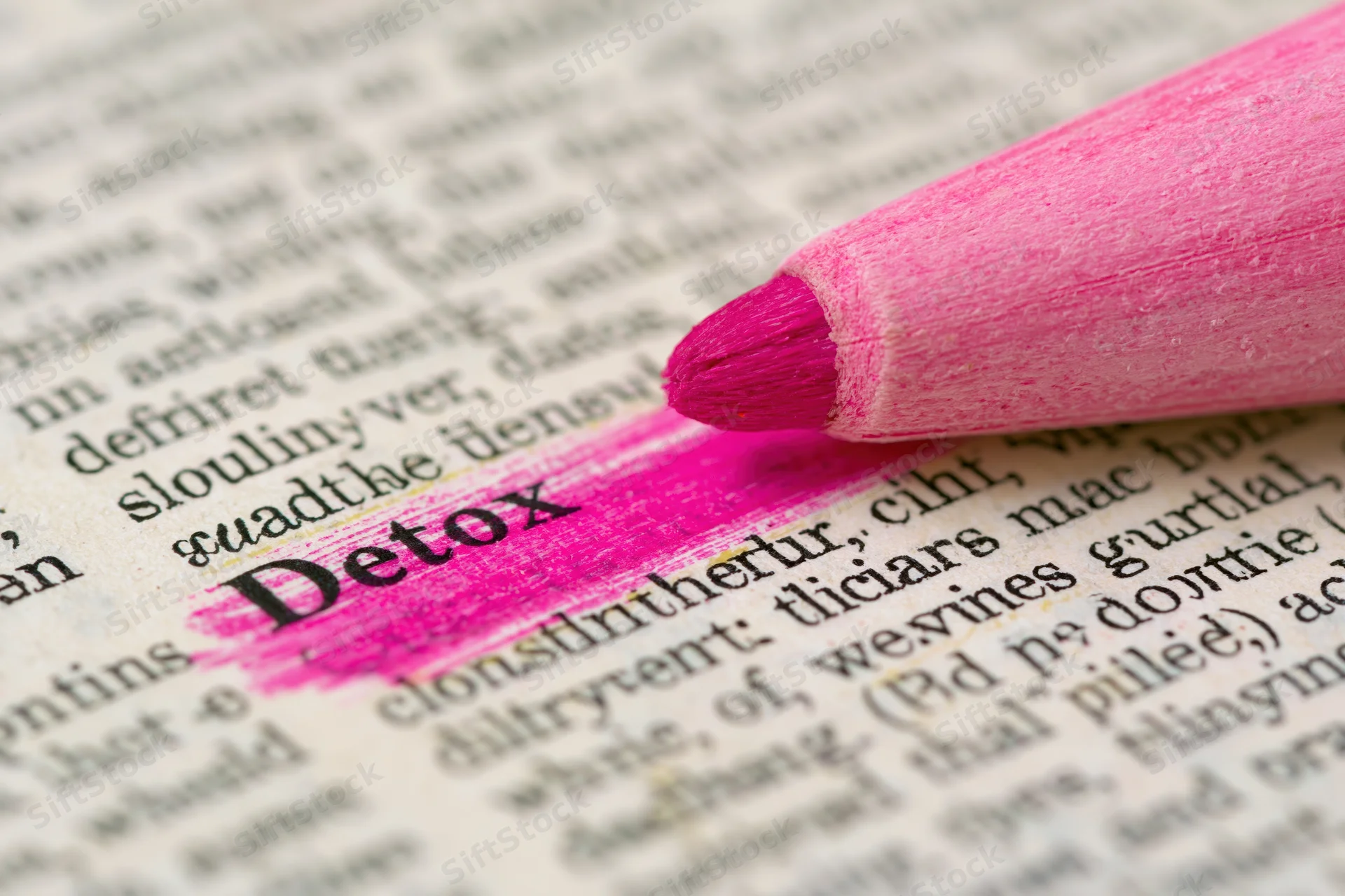 Pink highlighter marking the word detox in a dictionary page