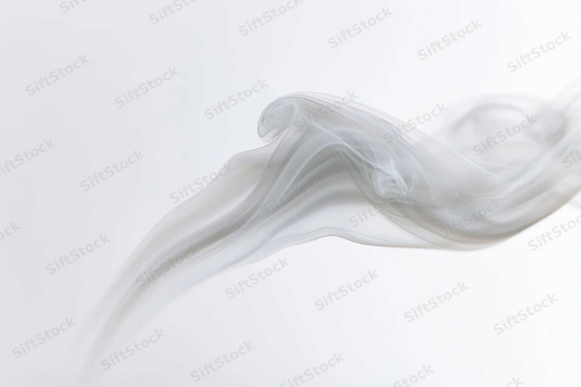 A thin wisp of white smoke curling upward against a plain white background