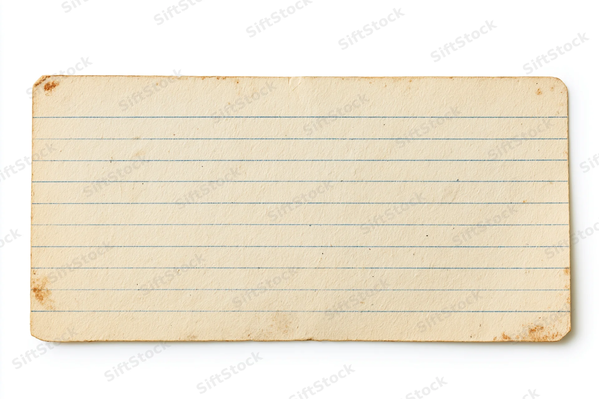 Aged blank lined index card lying flat on white background