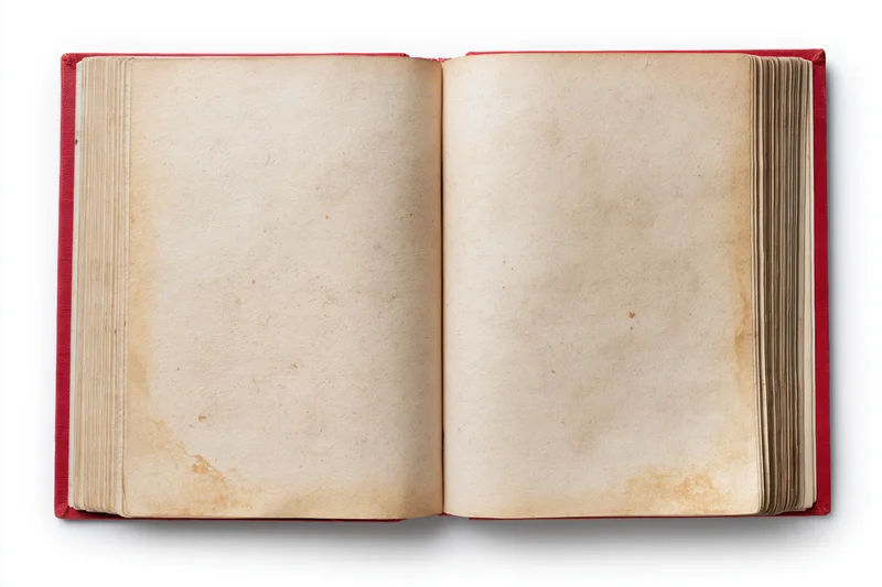 Open vintage hardcover book with blank aged pages on white background