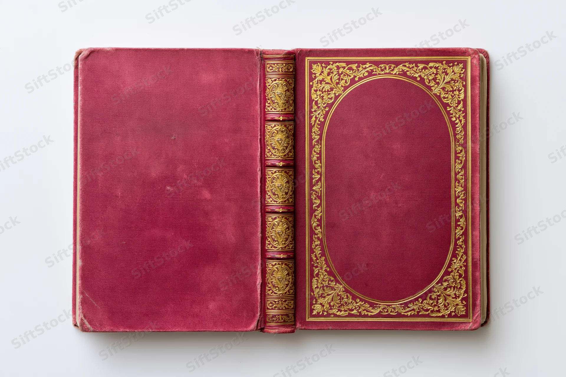 Antique hardcover book opened flat showing both covers and spine on white background