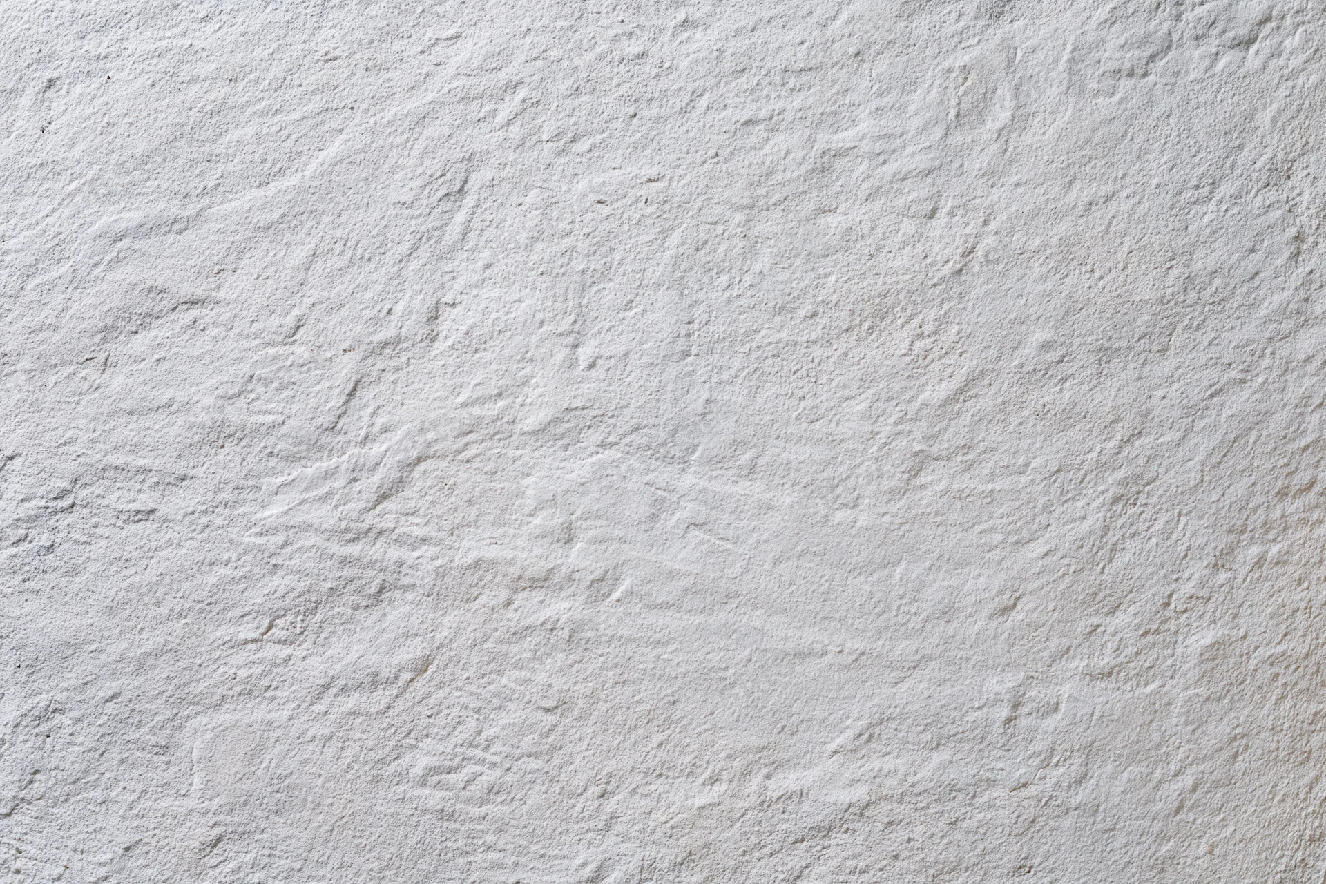 Textured concrete wall surface filling the frame