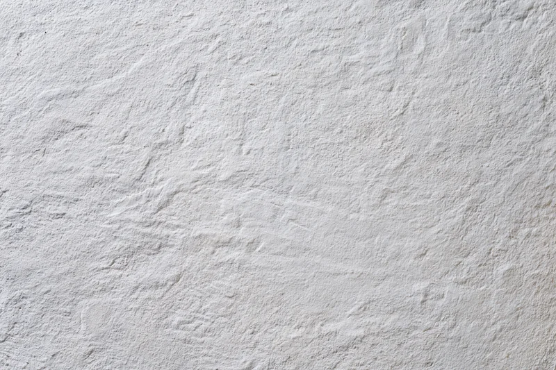 Textured concrete wall surface filling the frame