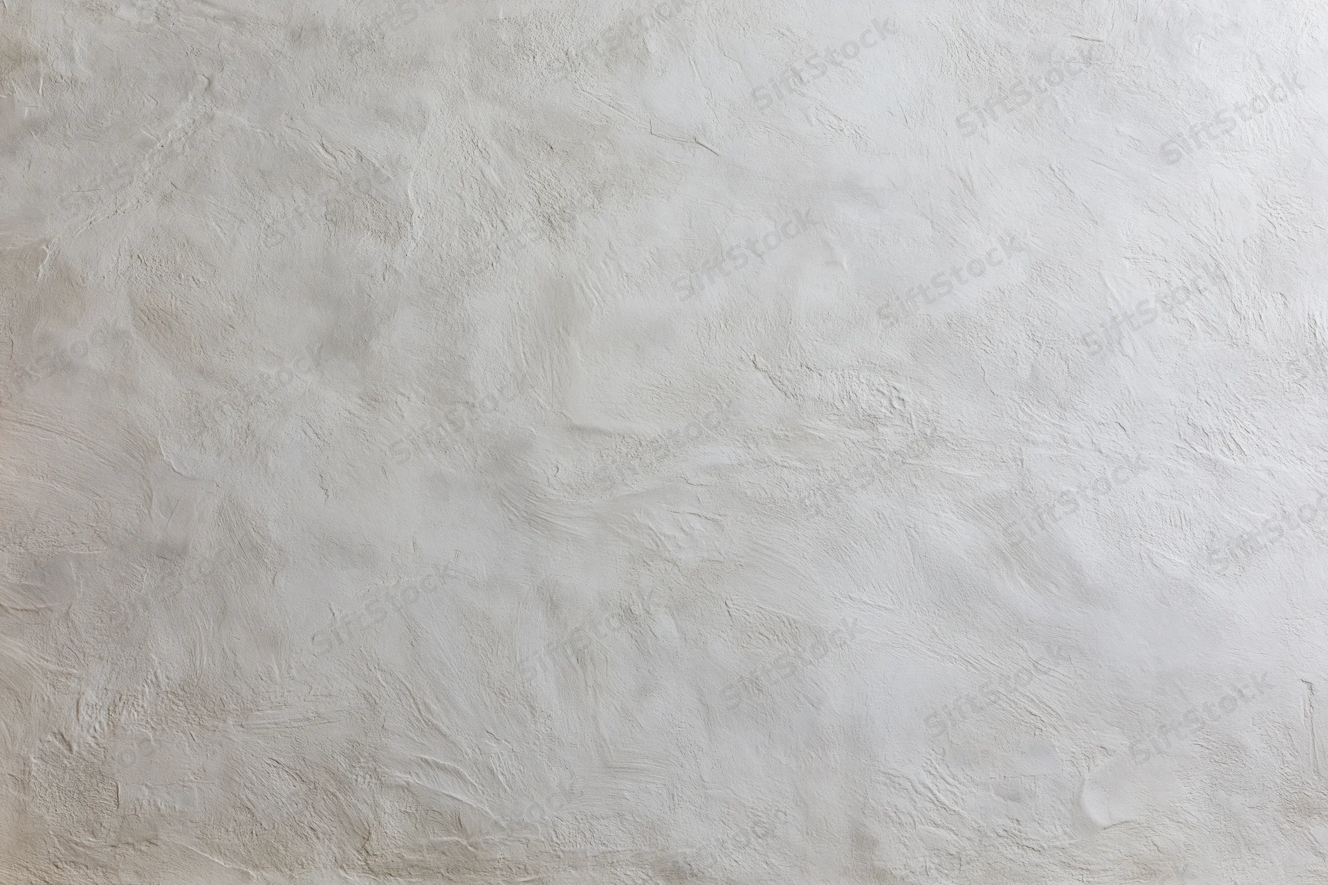 Textured concrete wall surface filling the frame