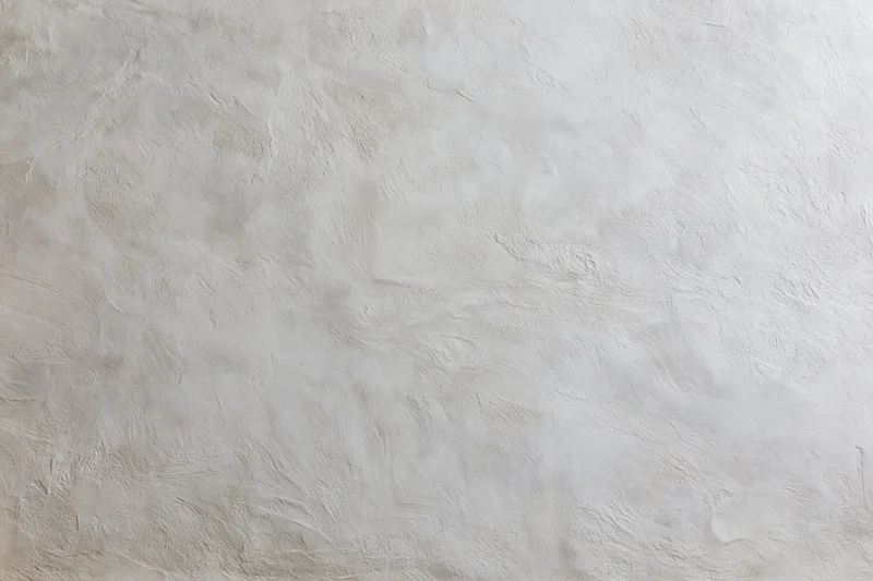 Textured concrete wall surface filling the frame