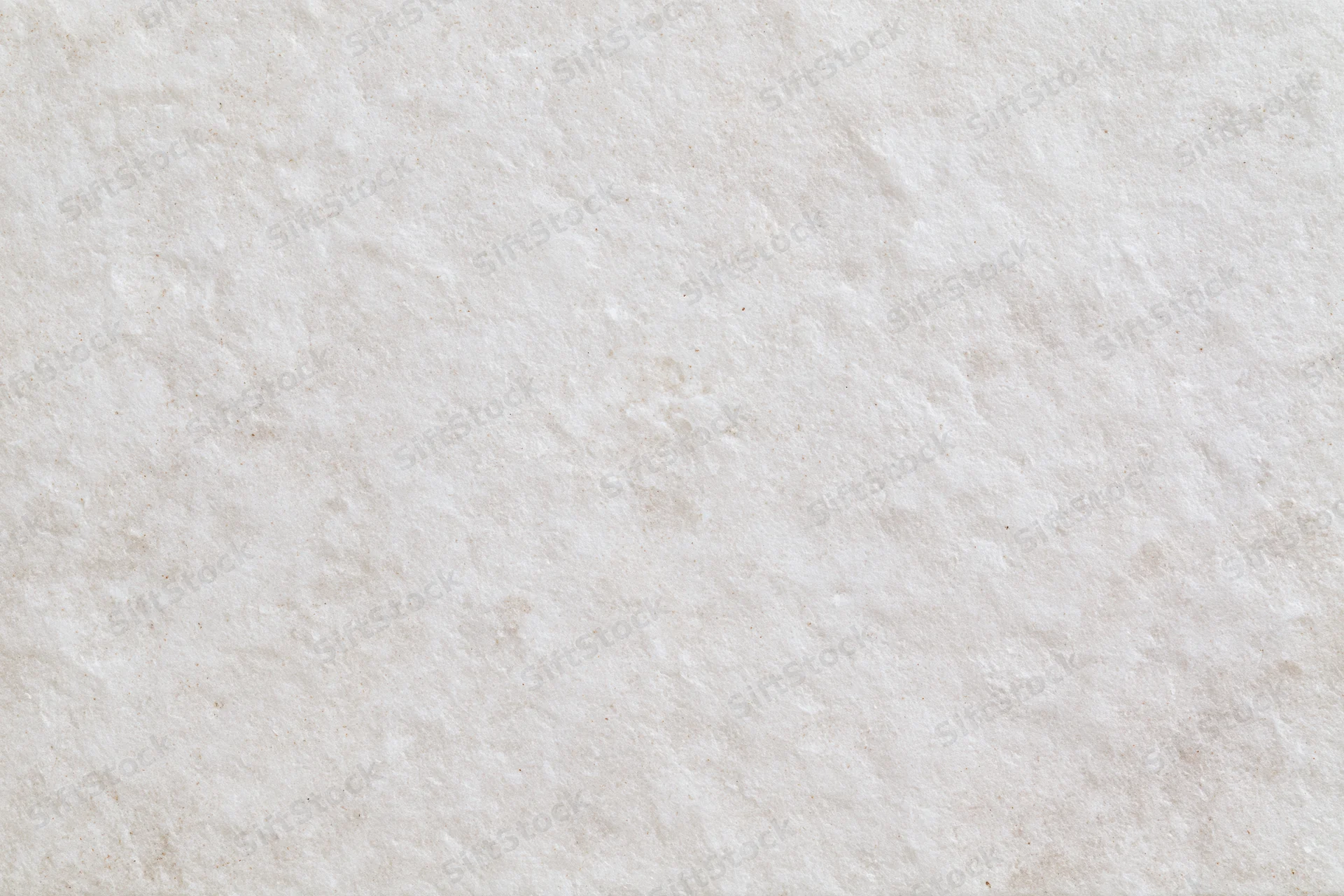Close-up of smooth limestone or concrete surface with natural texture and veining