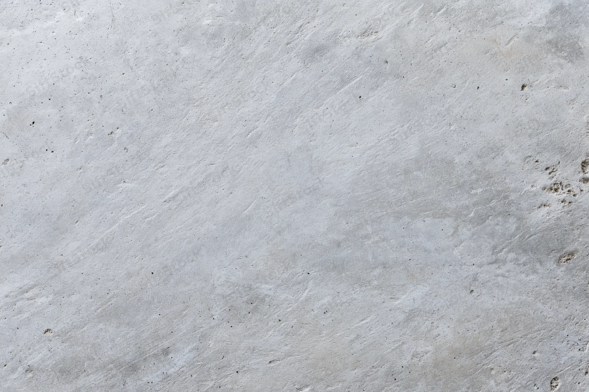 Close-up of a weathered concrete wall surface filling the frame