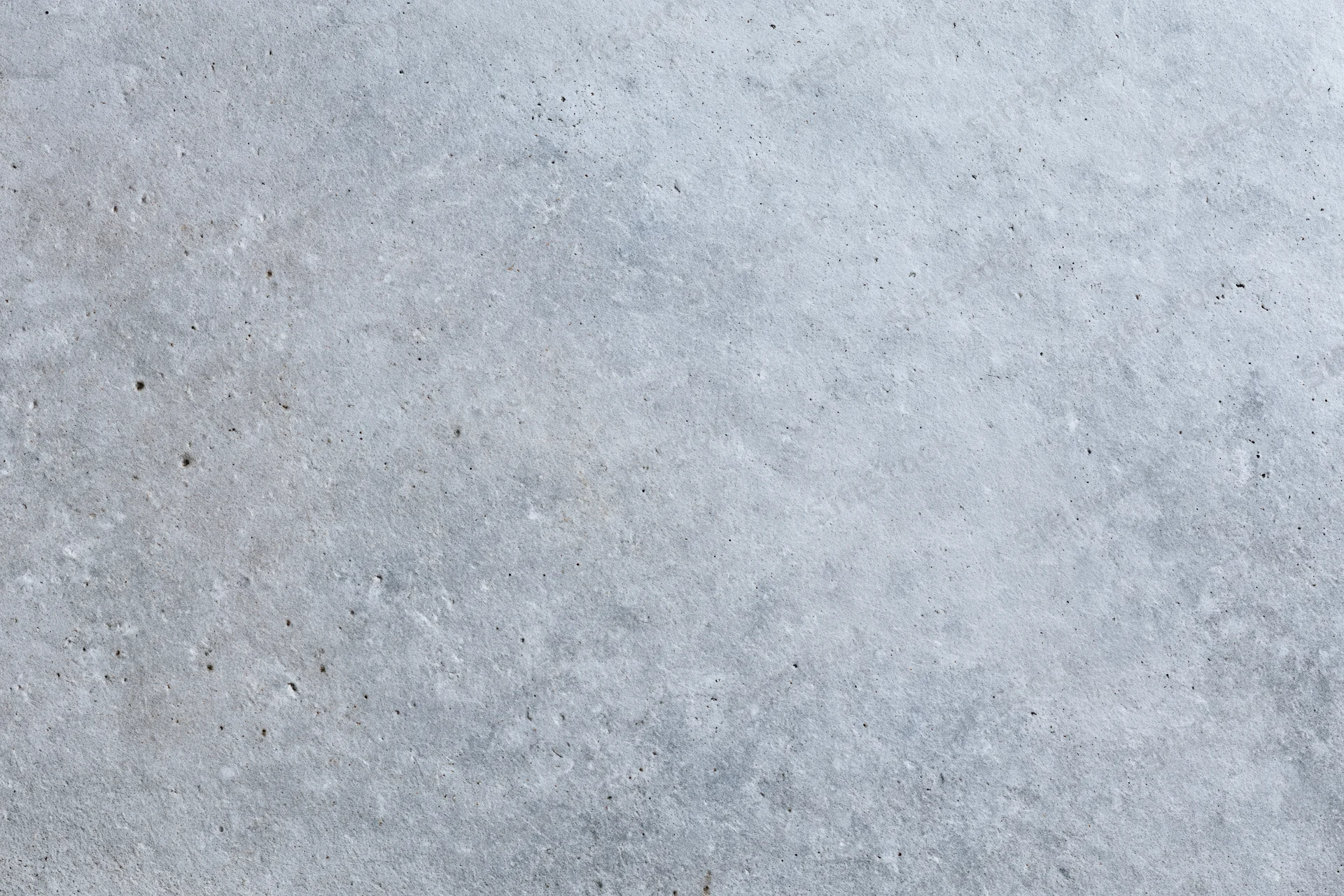 Close-up of a flat gray concrete wall surface filling the frame