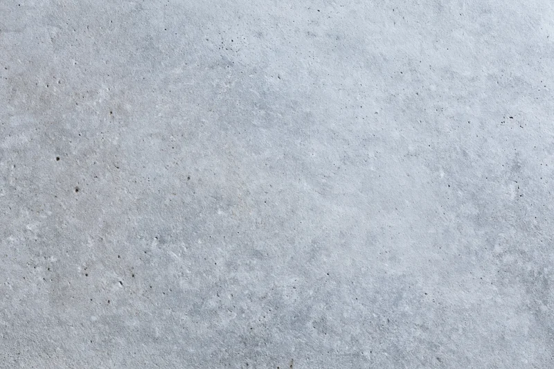 Close-up of a flat gray concrete wall surface filling the frame