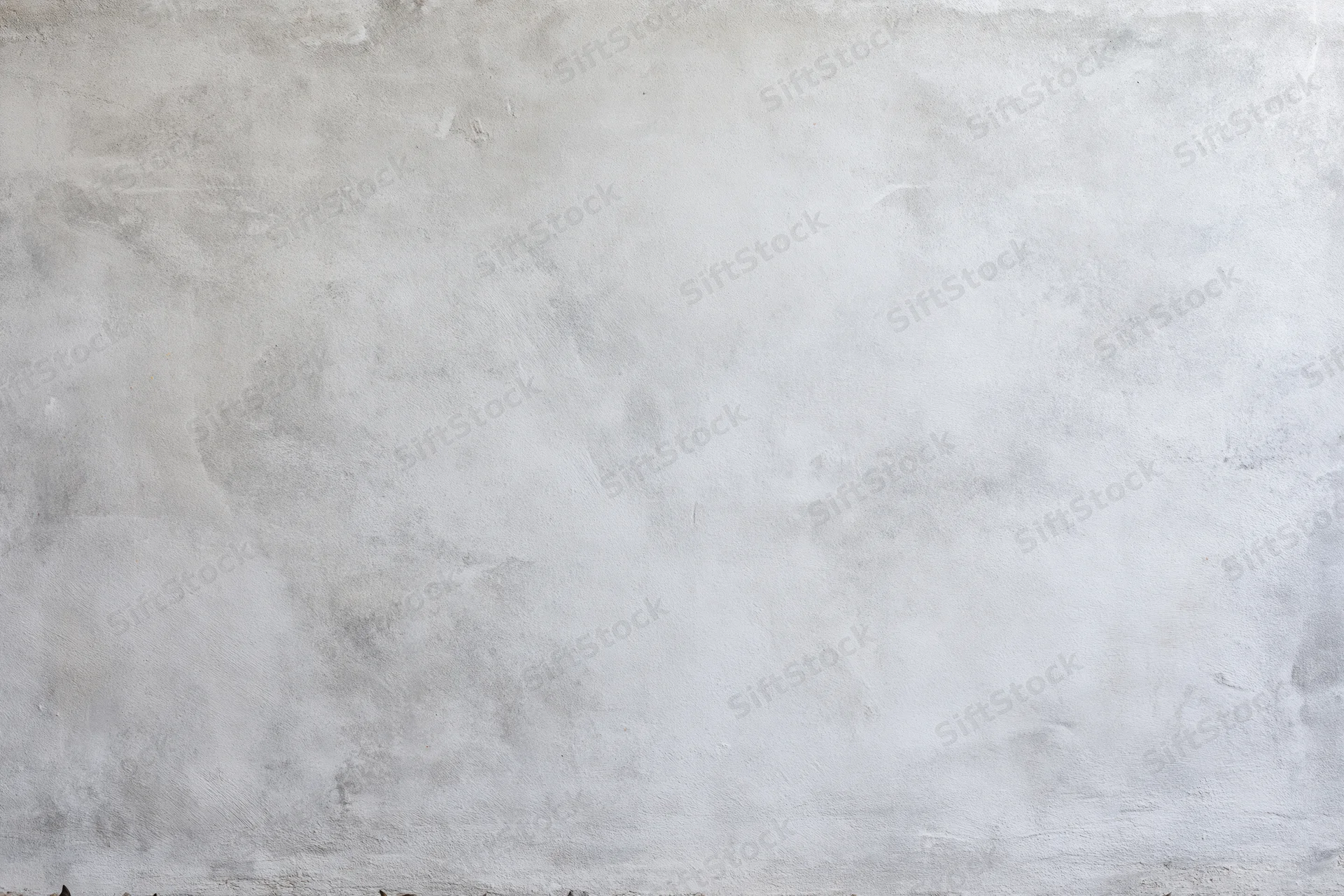 Close-up of a textured concrete wall surface filling the frame