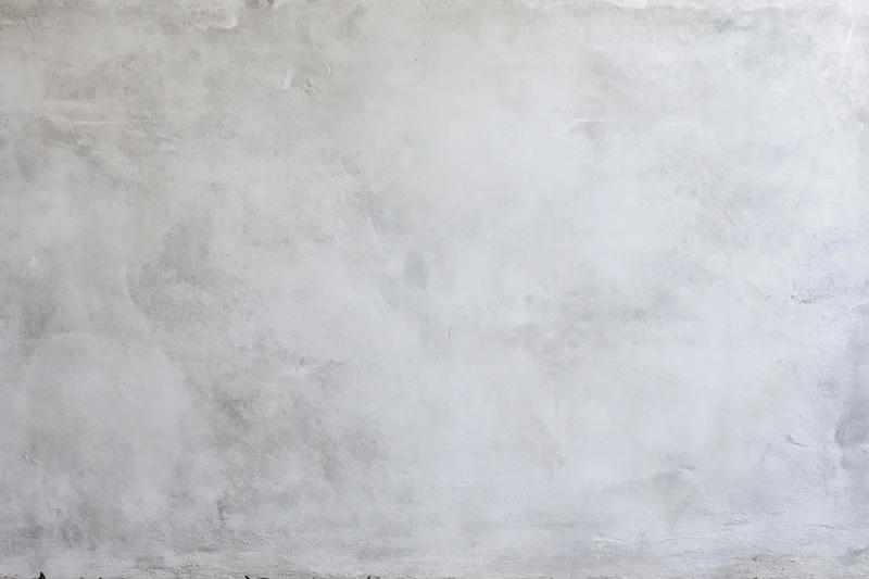 Close-up of a textured concrete wall surface filling the frame