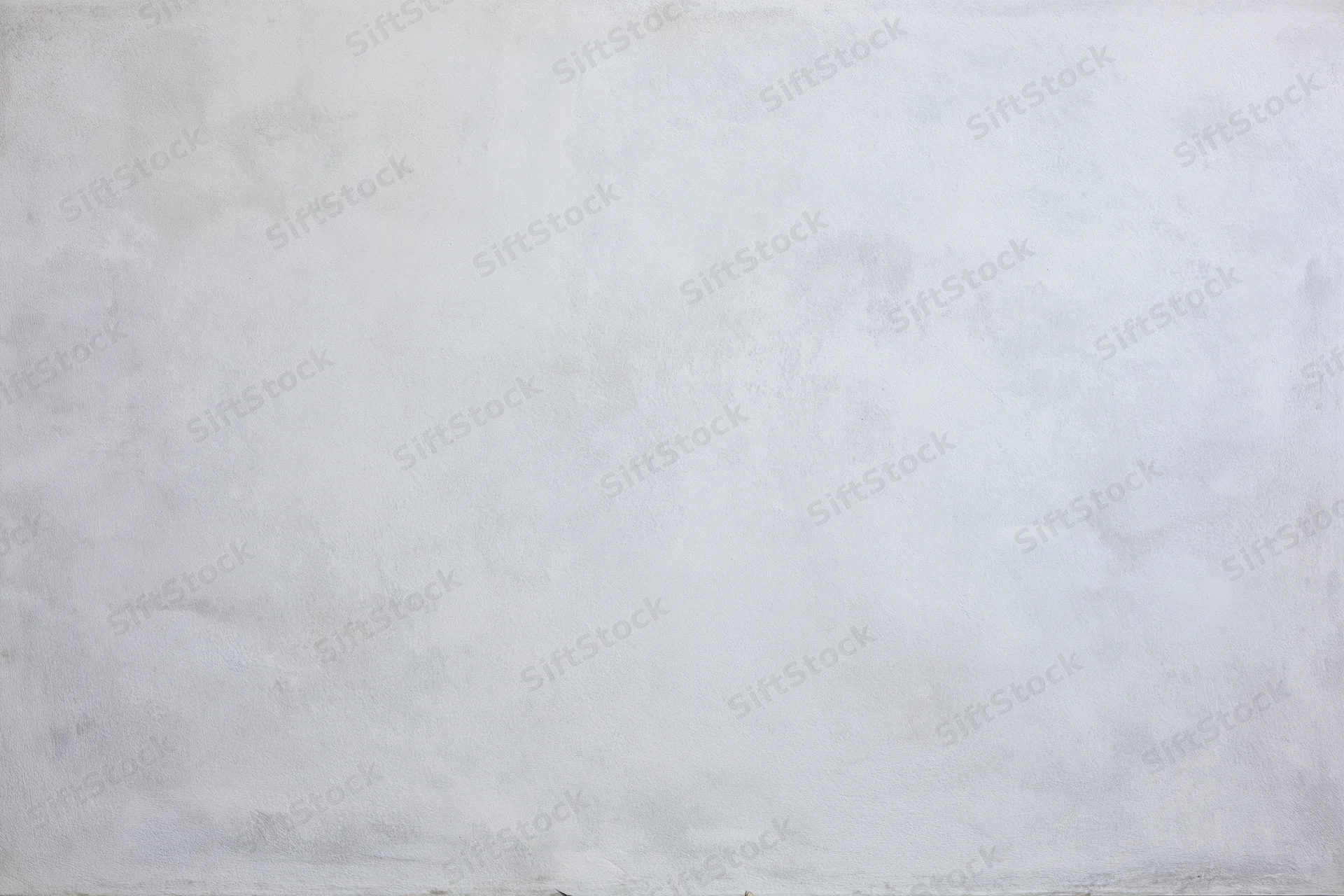 Close-up of a bare concrete wall surface filling the frame
