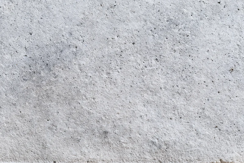 Close-up of a rough gray concrete surface filling the frame