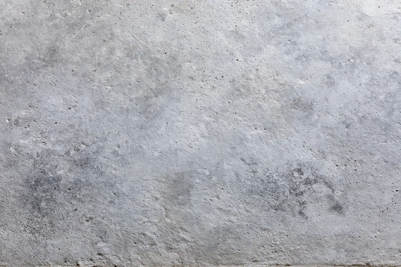 Close-up of a weathered concrete wall surface filling the frame