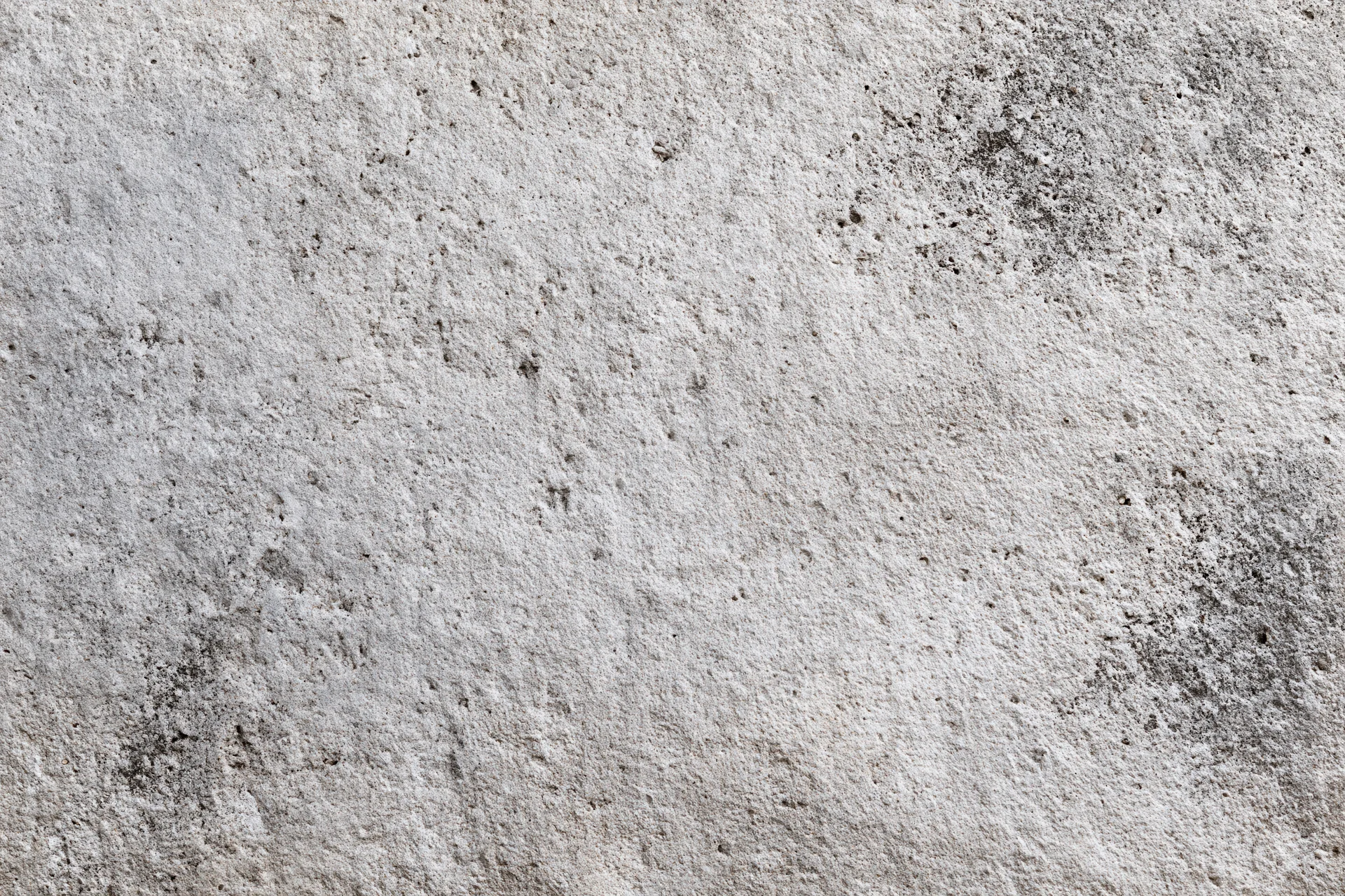 Close-up of a weathered concrete surface filling the frame