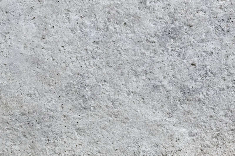 Close-up of a rough gray concrete surface filling the frame