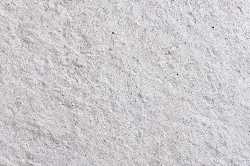 Close-up of rough concrete wall surface filling the frame