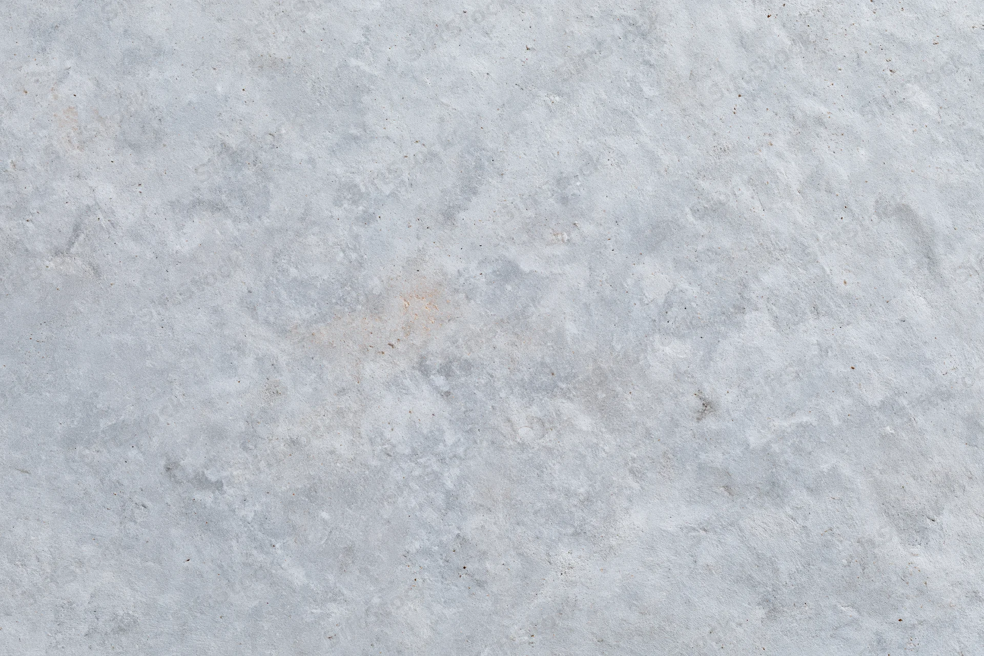 Close-up of a rough gray concrete wall surface filling the frame