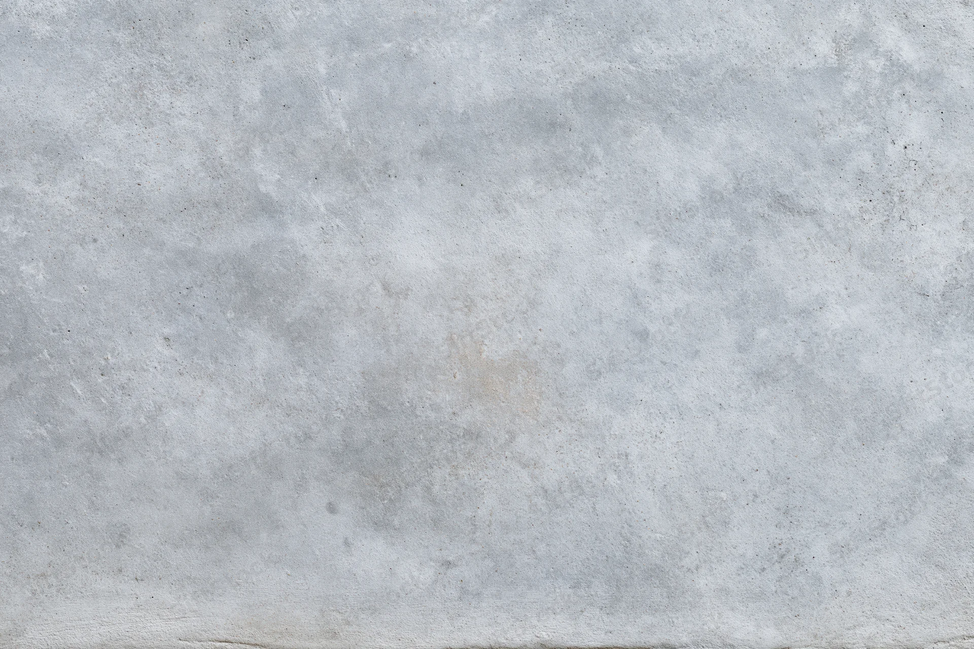 Flat concrete wall surface filling the entire frame