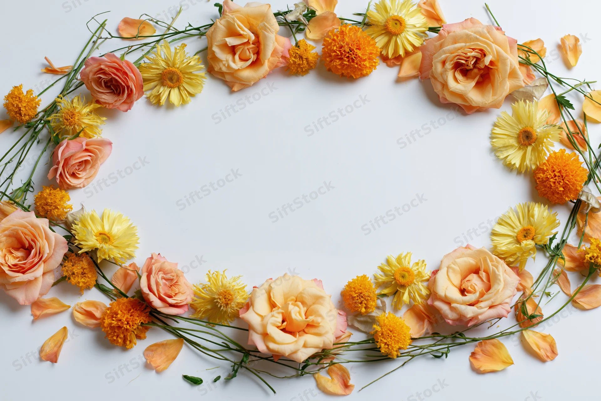Circular floral arrangement of peach roses, yellow daisies and orange marigolds on white background with copyspace
