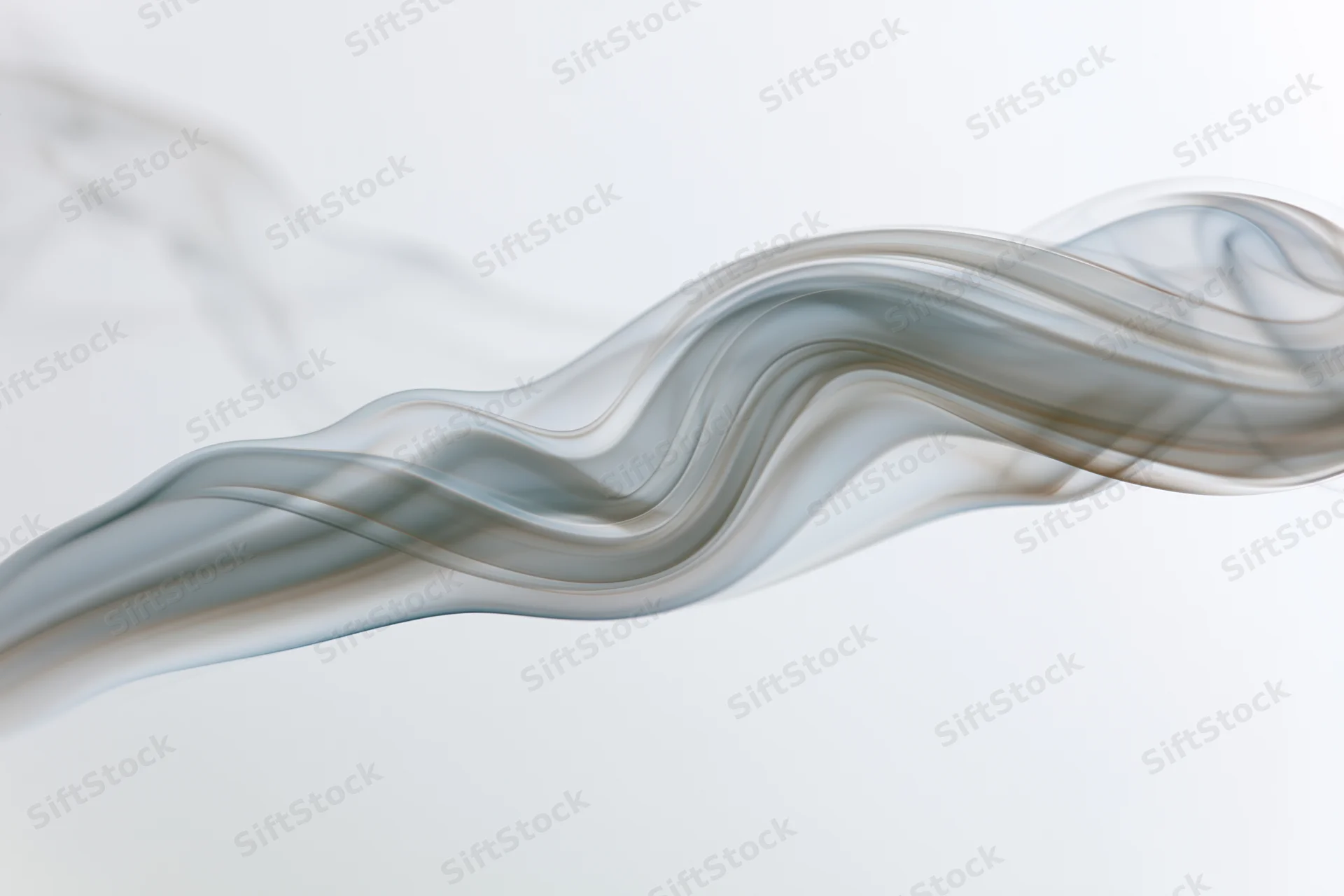 Thin wisp of white smoke curling and rising in soft undulations against a plain background