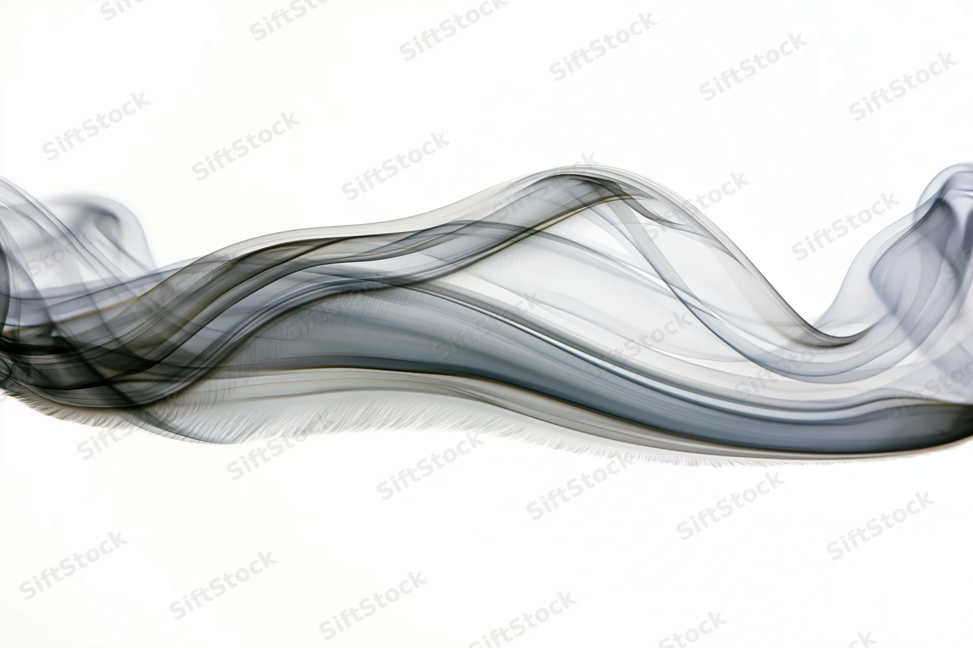 Wisps of dark smoke curling and flowing across a white background