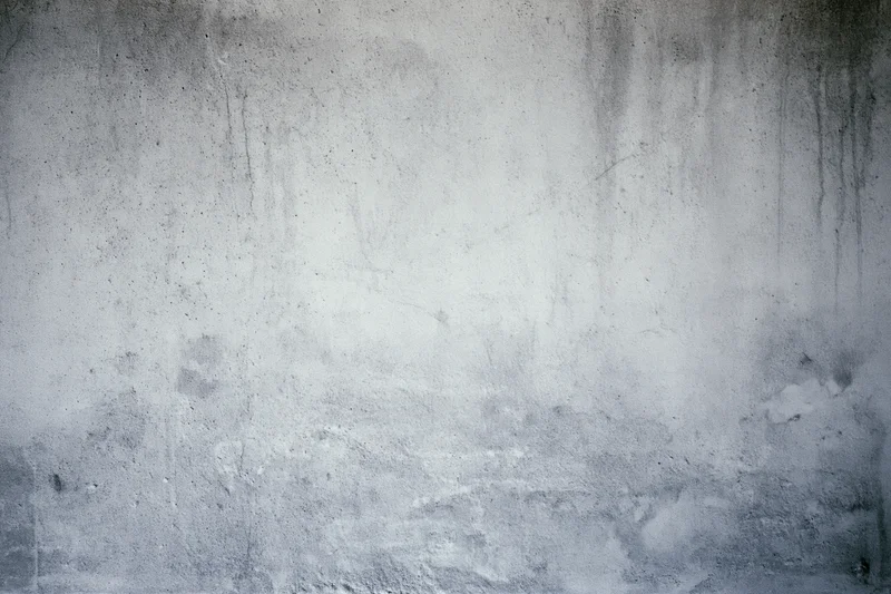 Weathered concrete wall surface filling the frame