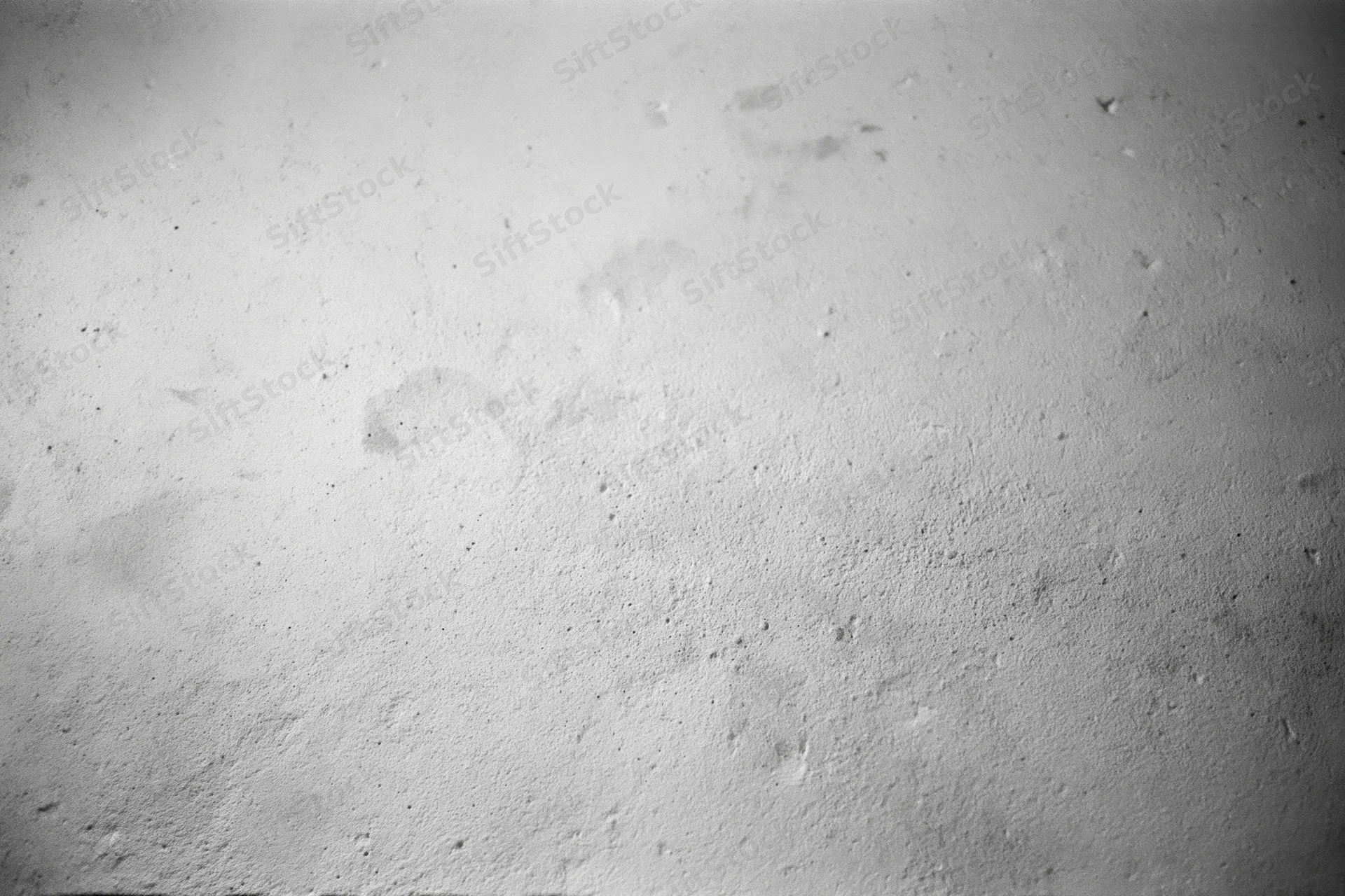 Weathered concrete wall surface filling the frame