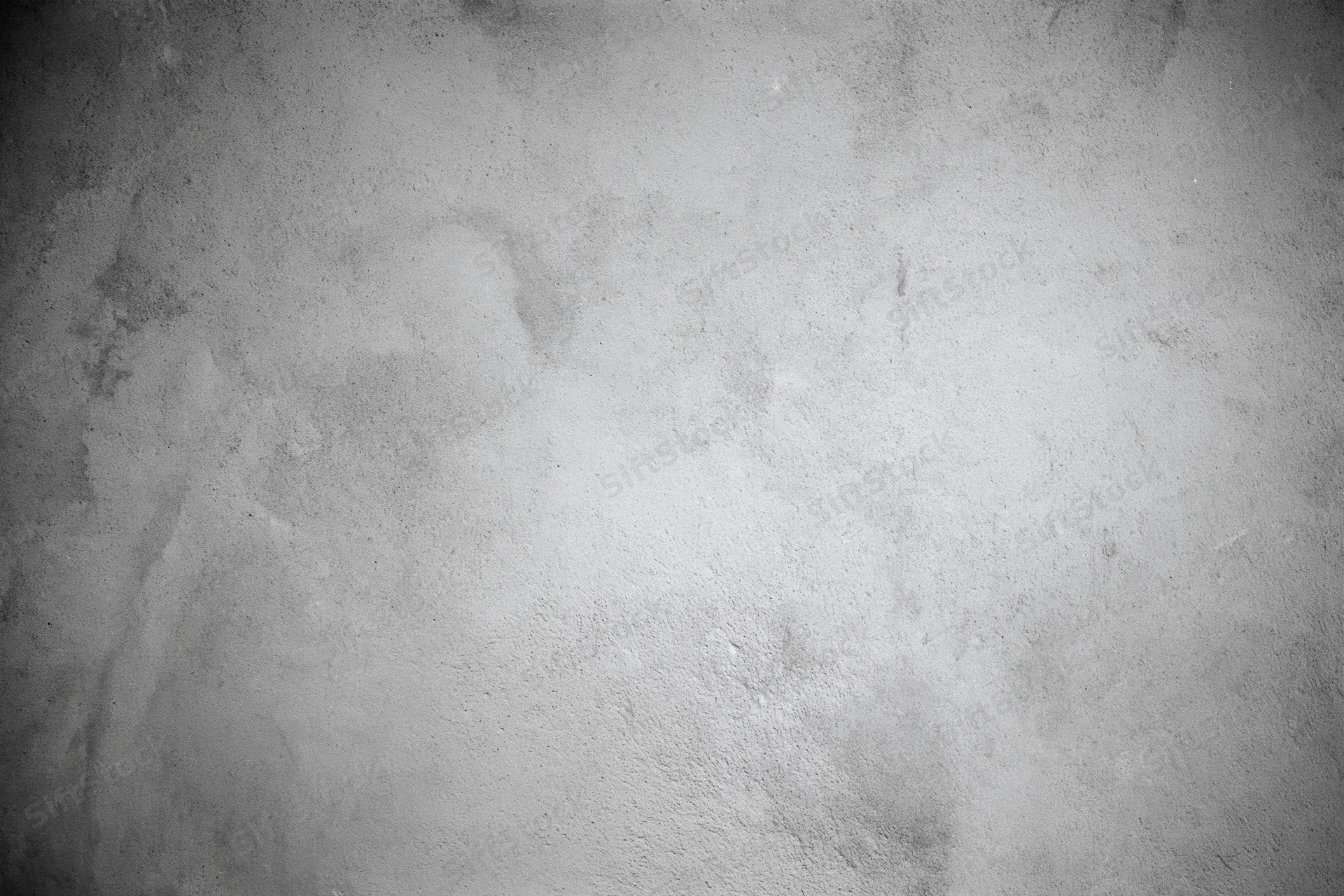 Weathered concrete wall surface filling the frame