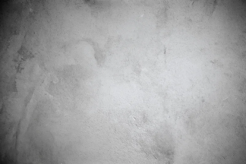 Weathered concrete wall surface filling the frame