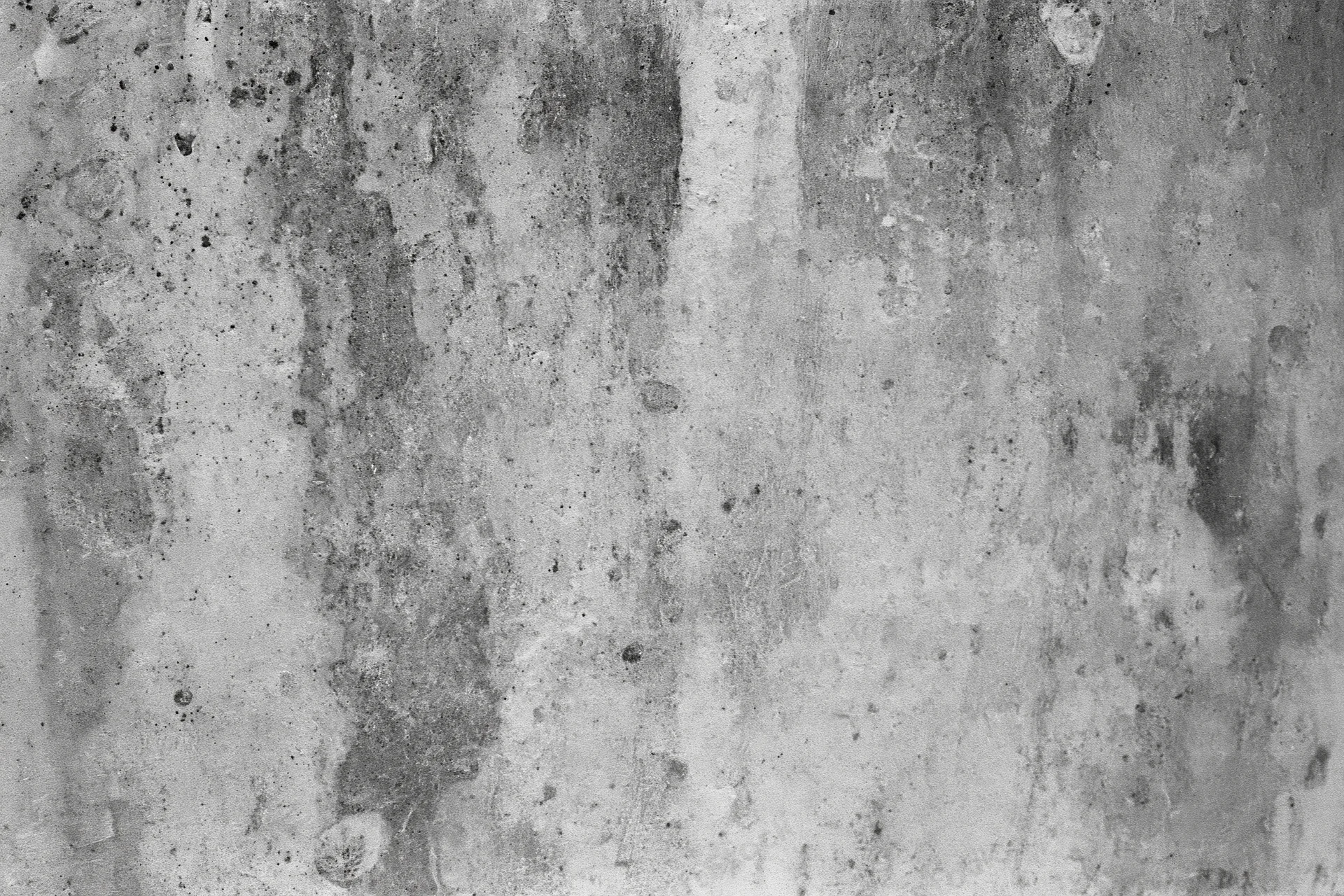 Weathered concrete wall surface filling the frame