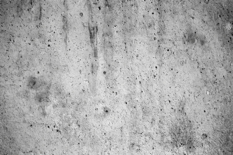 Weathered concrete wall surface filling the frame