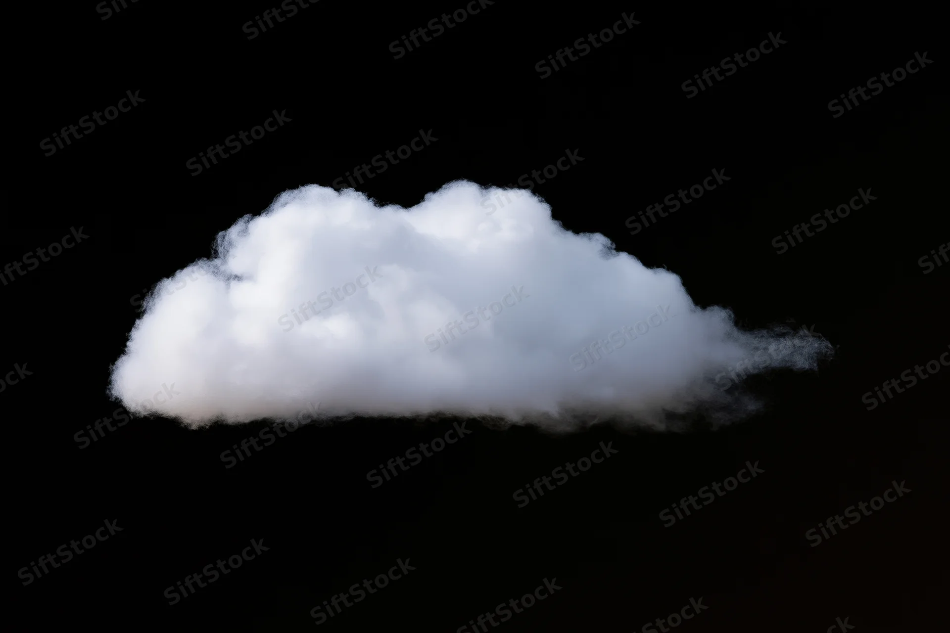 Fluffy white cumulus cloud isolated against a solid black background