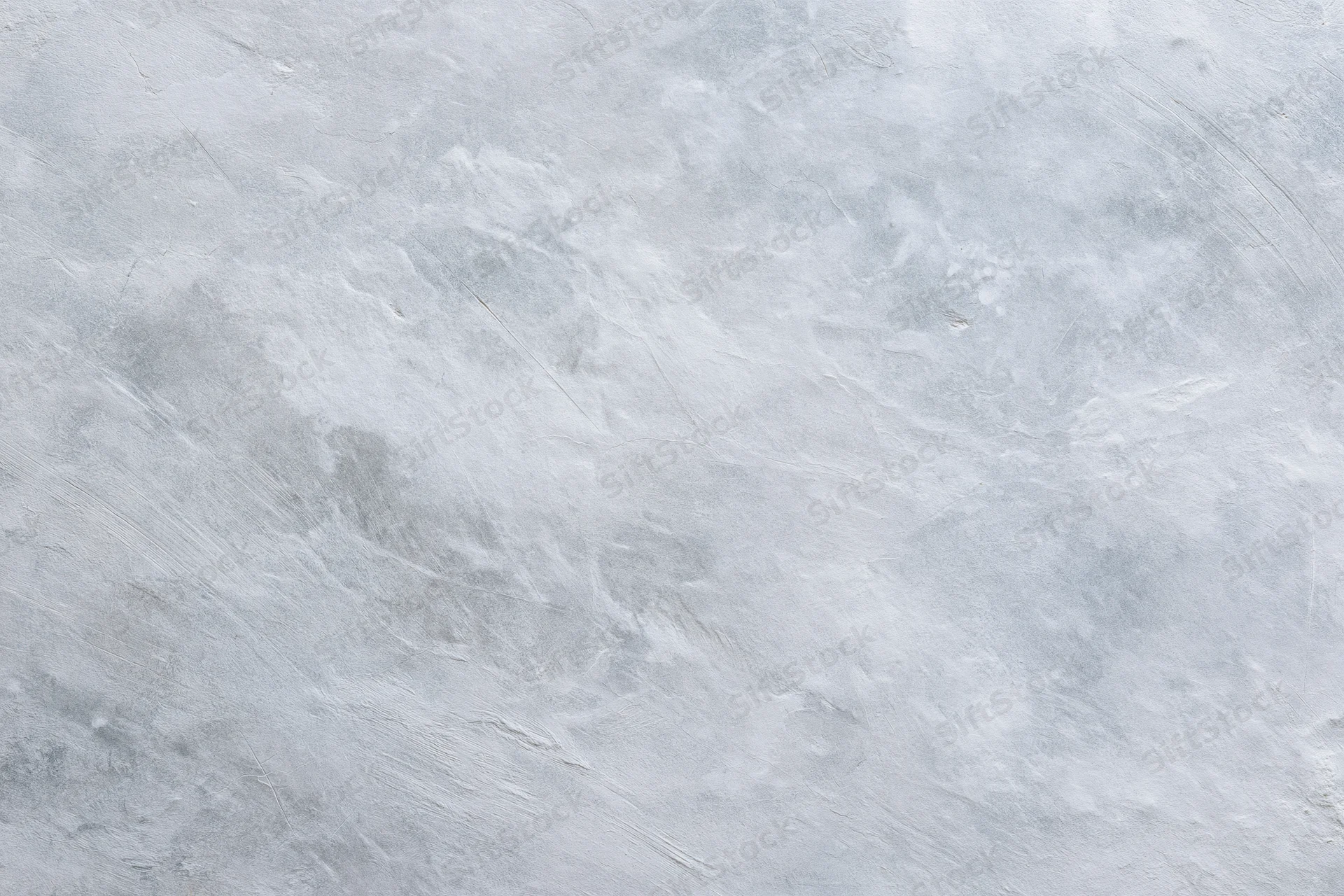 Close-up of a bare concrete wall surface with rough texture filling the frame