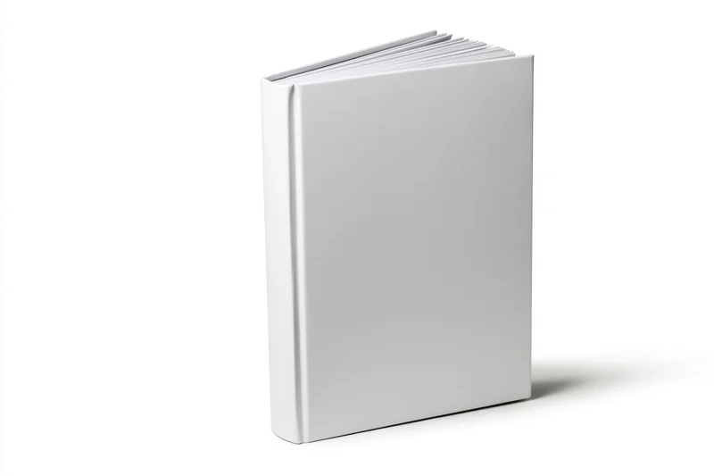 Blank white hardcover book standing upright on white background