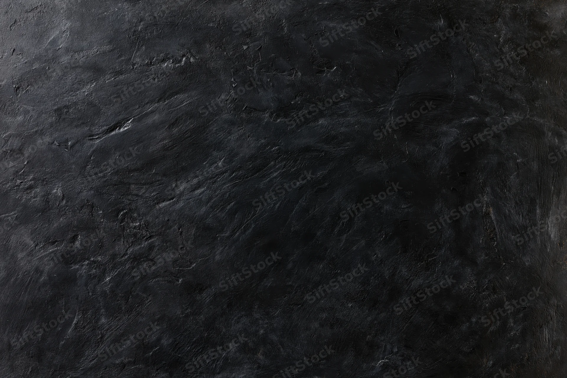 Dark weathered concrete wall surface filling the frame