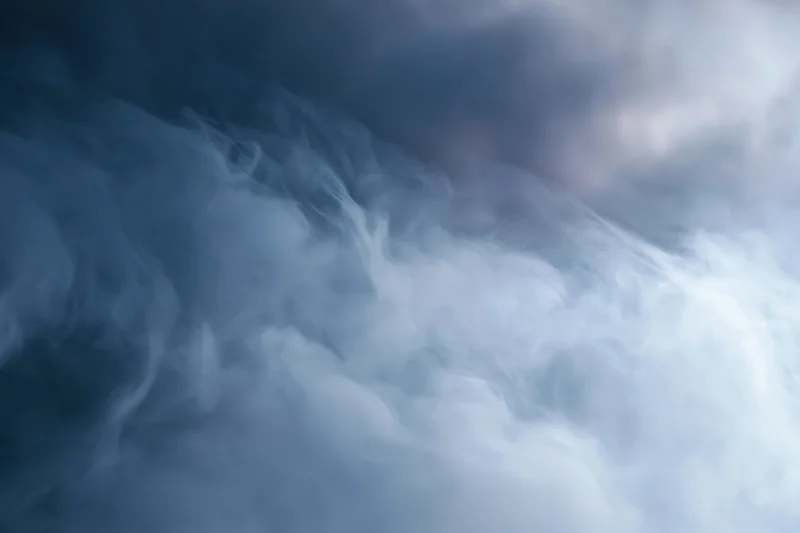 Dense swirling smoke filling the frame in an abstract closeup view