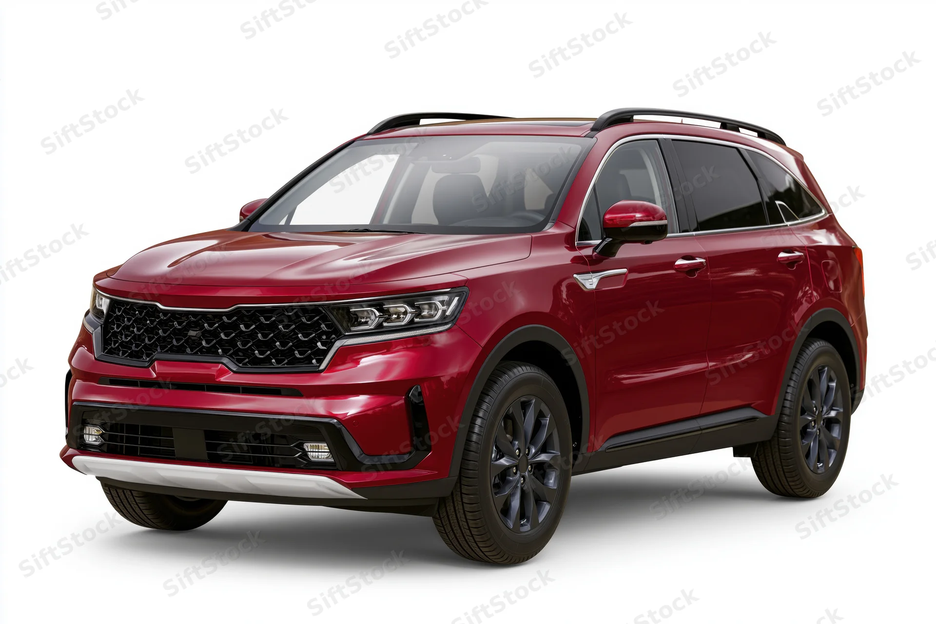 Red midsize suv shown at three-quarter front angle isolated on white background