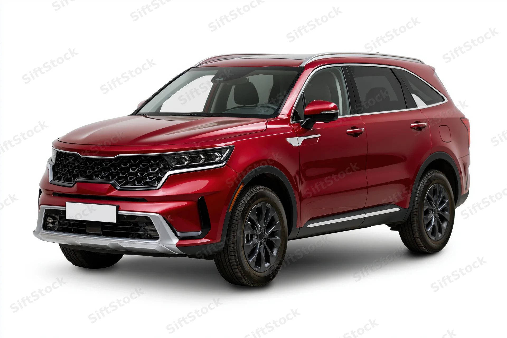 Red midsize suv shown at three quarter front angle isolated on white background