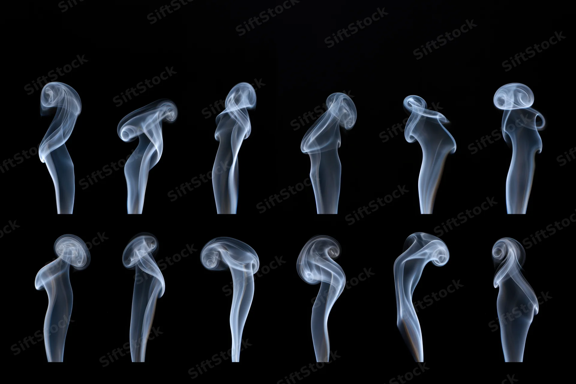 Ten white smoke plumes arranged in two rows against a black background