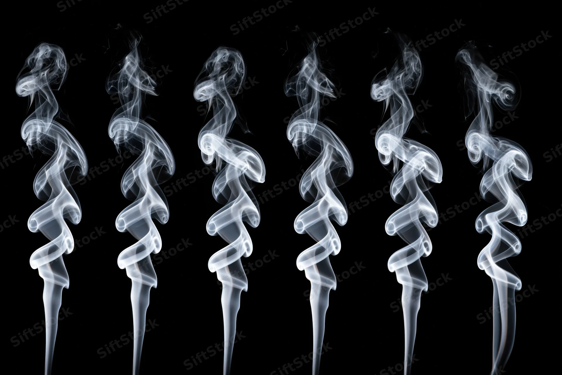 Six white smoke plumes rising in swirling patterns against a black background