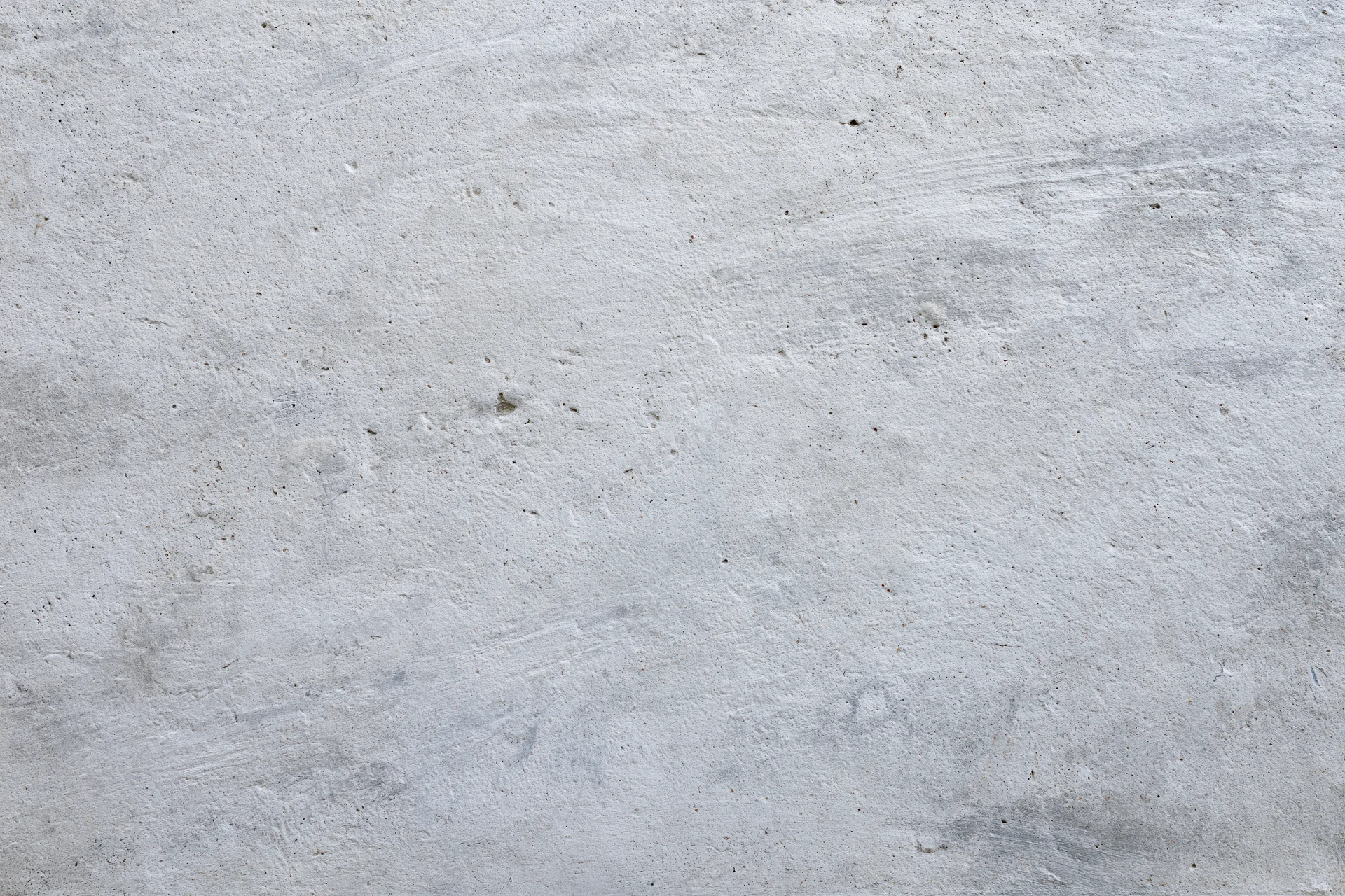 Textured concrete wall surface filling the frame