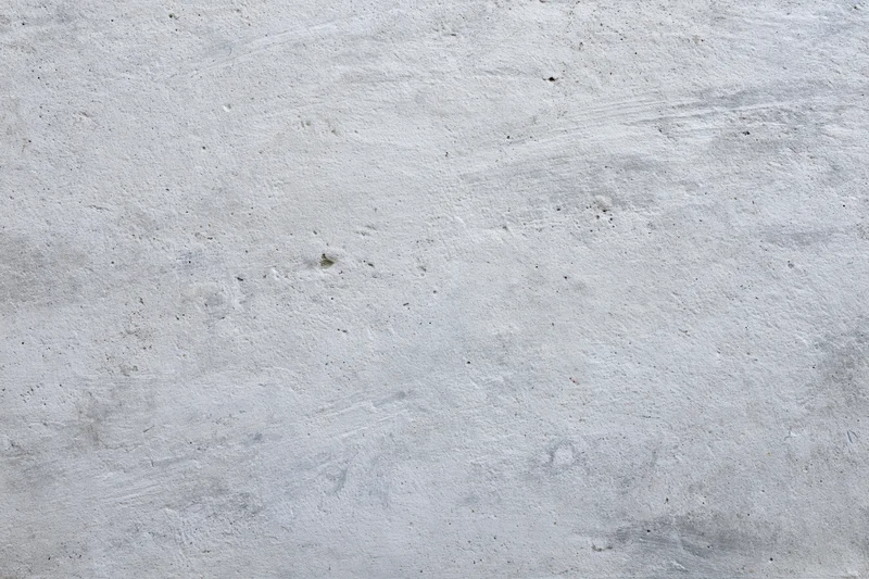 Textured concrete wall surface filling the frame
