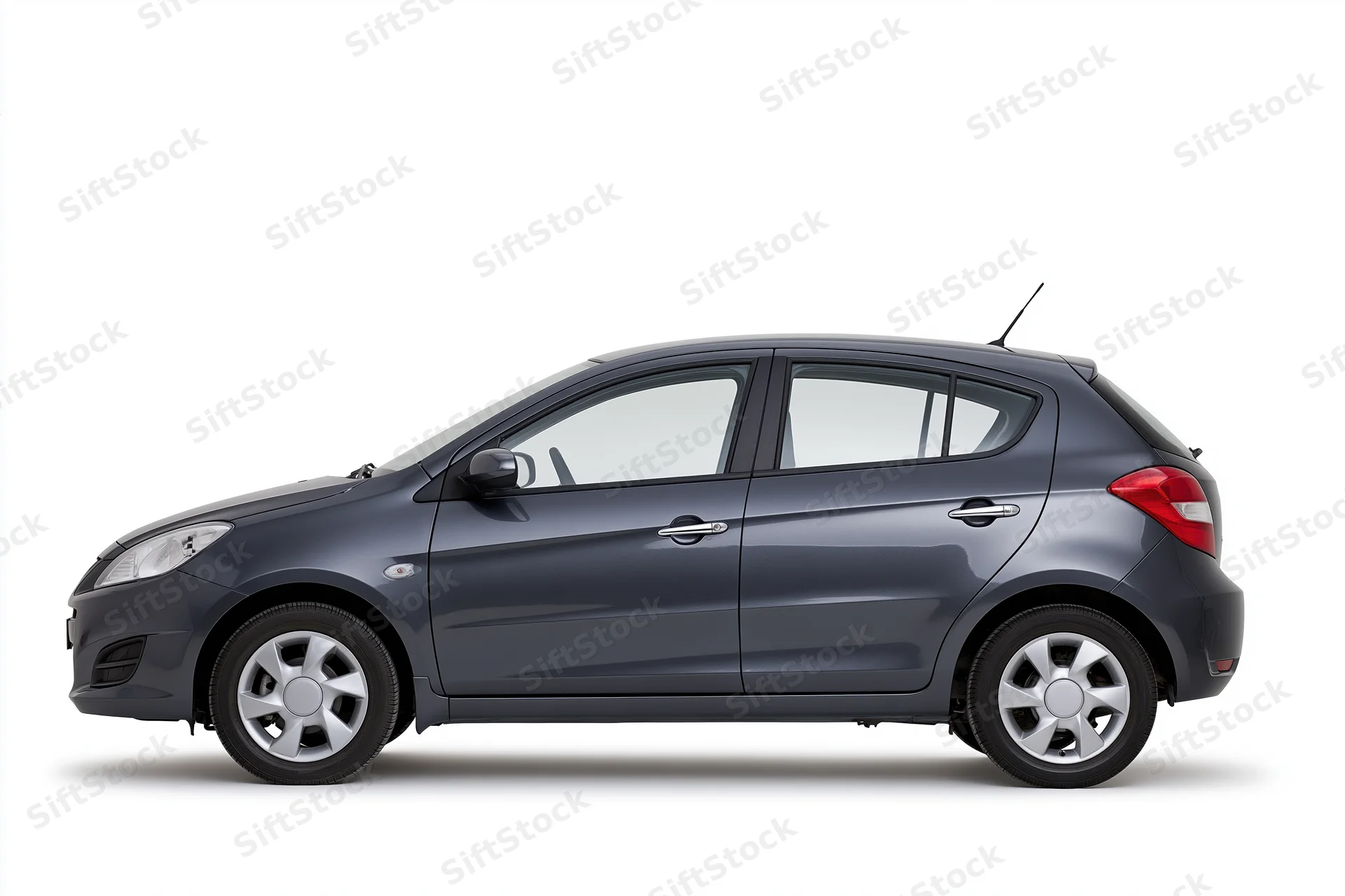Dark gunmetal grey compact hatchback car shown in side profile against white background