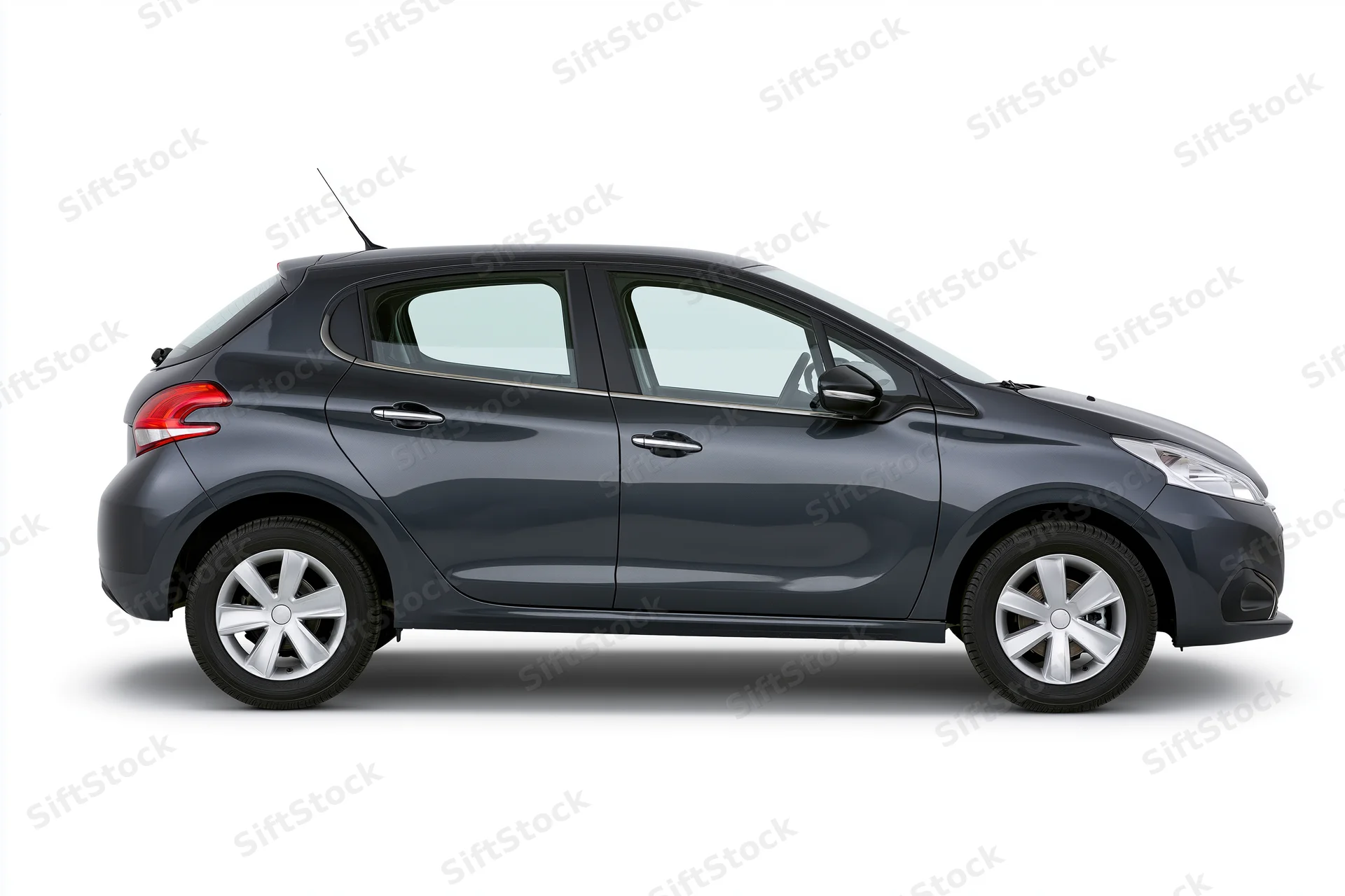 Dark gunmetal grey compact hatchback shown in side profile against white background