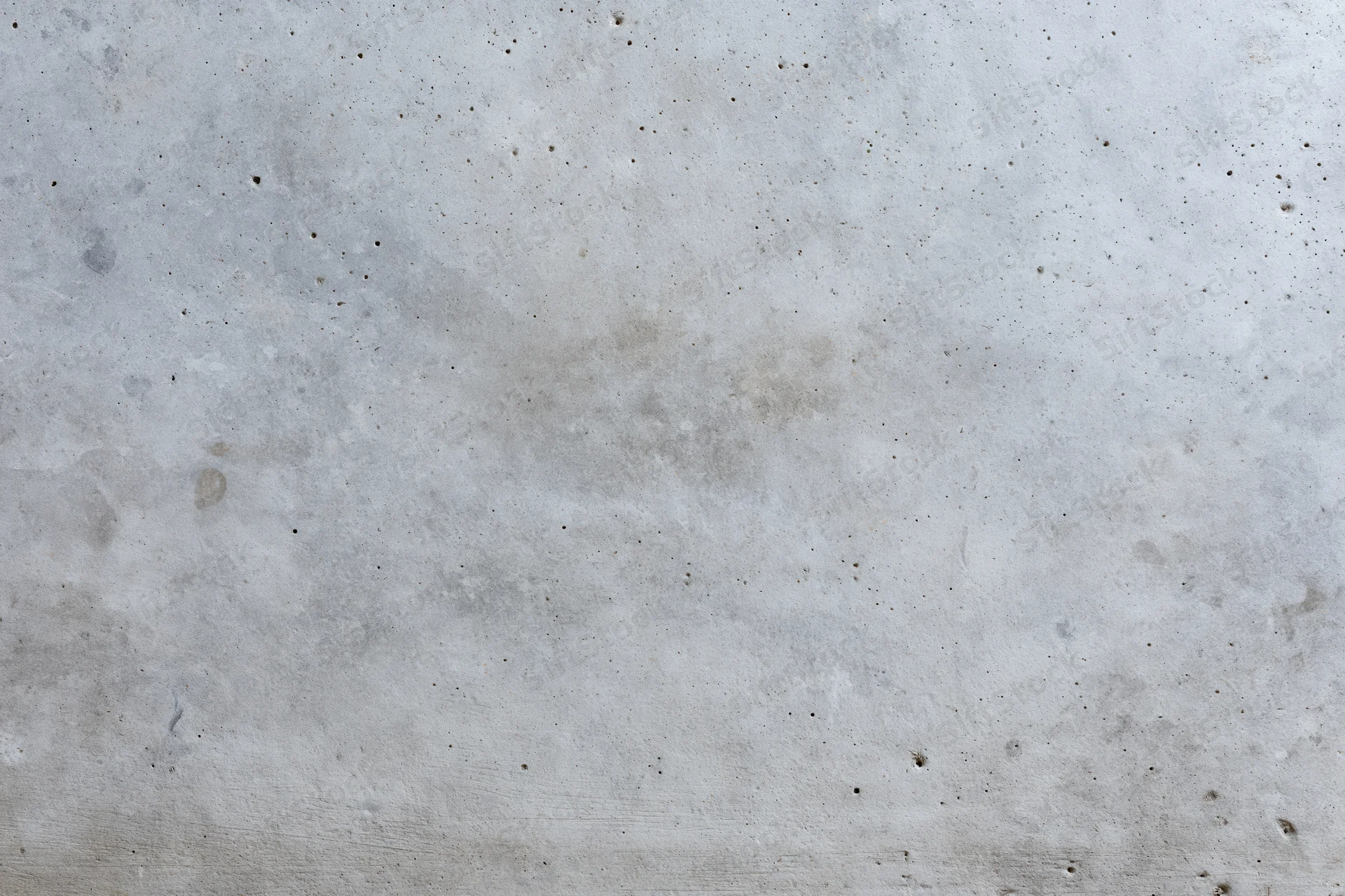 Close-up of a weathered concrete wall surface filling the frame