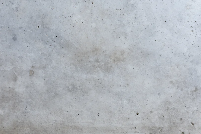 Close-up of a weathered concrete wall surface filling the frame